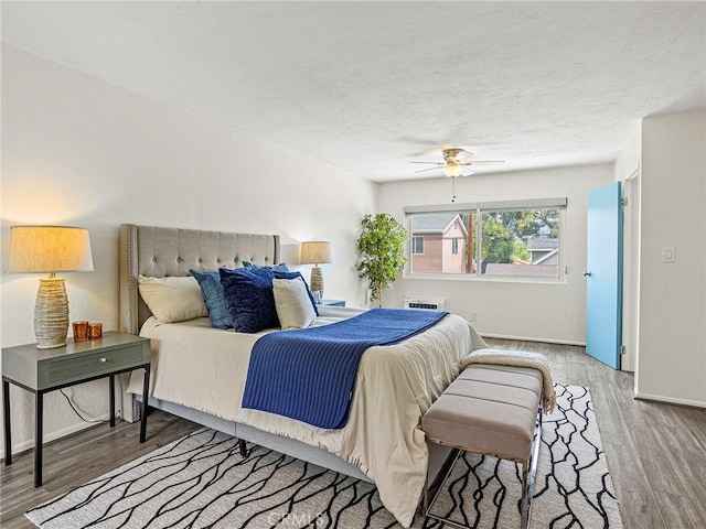 1234 N Pass Ave, Burbank, CA 91505 - bedroom featuring wood finished floors, a textured ceiling, and ceiling fan
