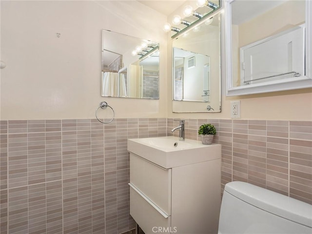 1234 N Pass Ave, Burbank, CA 91505 - bathroom with vanity and tile walls