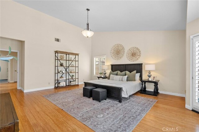3891 Hunters Grove Ct, Moorpark, CA 93021 - bedroom with light wood-style flooring and high vaulted ceiling