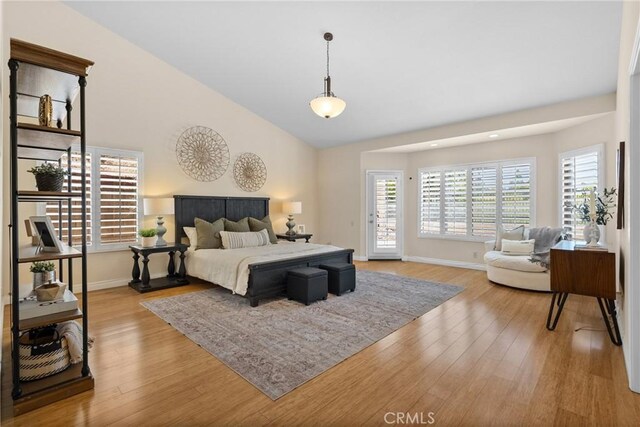 3891 Hunters Grove Ct, Moorpark, CA 93021 - bedroom featuring light wood-type flooring, access to exterior, and high vaulted ceiling