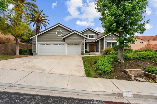 3891 Hunters Grove Ct, Moorpark, CA 93021 - view of front of home with a garage and concrete driveway