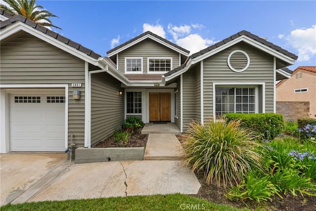 3891 Hunters Grove Ct, Moorpark, CA 93021 - view of front of property with an attached garage and driveway
