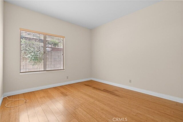 3891 Hunters Grove Ct, Moorpark, CA 93021 - spare room featuring light wood-style floors and baseboards