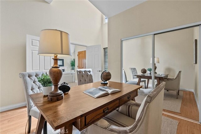 3891 Hunters Grove Ct, Moorpark, CA 93021 - office featuring light wood-type flooring and a high ceiling