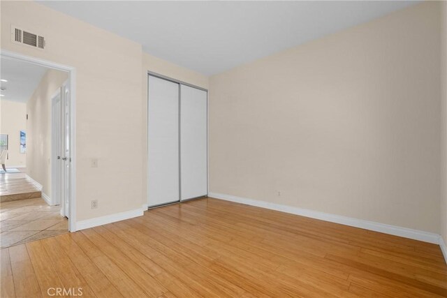 3891 Hunters Grove Ct, Moorpark, CA 93021 - unfurnished bedroom featuring light wood finished floors and a closet
