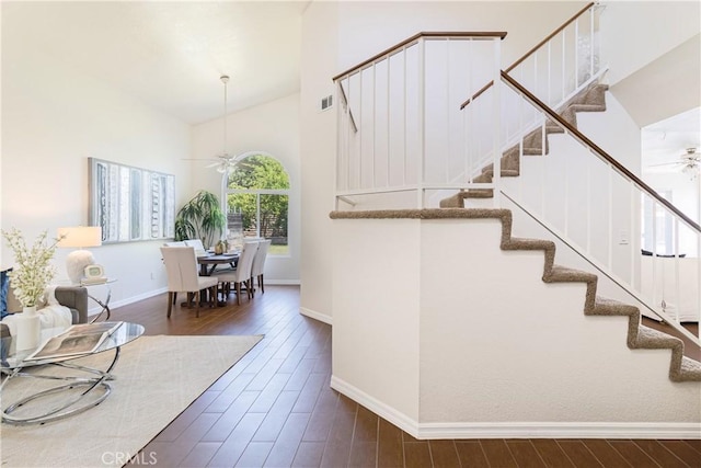 1534 W Summerset Dr, Rialto, CA 92377 - stairs featuring a ceiling fan, wood finished floors, and lofted ceiling