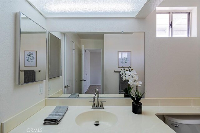 1534 W Summerset Dr, Rialto, CA 92377 - bathroom with vanity and toilet