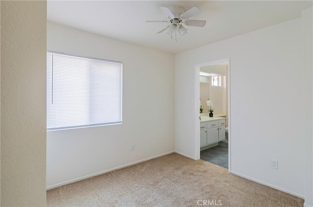 1534 W Summerset Dr, Rialto, CA 92377 - unfurnished room featuring light carpet and ceiling fan