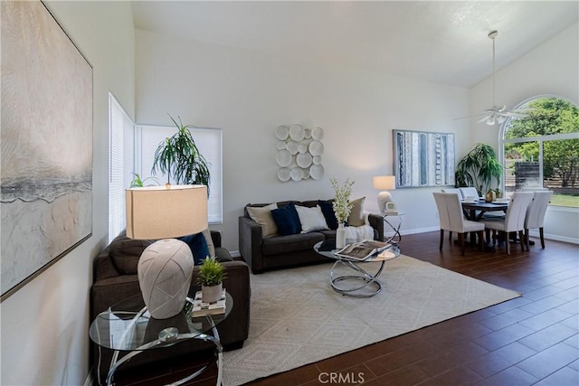1534 W Summerset Dr, Rialto, CA 92377 - living room featuring a ceiling fan, wood finished floors, and high vaulted ceiling