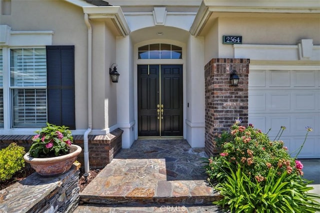 2564 Lunes Ln, Verne, CA 91750 - property entrance with stucco siding and a garage