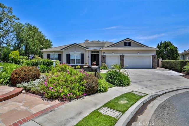 2564 Lunes Ln, Verne, CA 91750 - ranch-style home featuring a garage, concrete driveway, and stucco siding