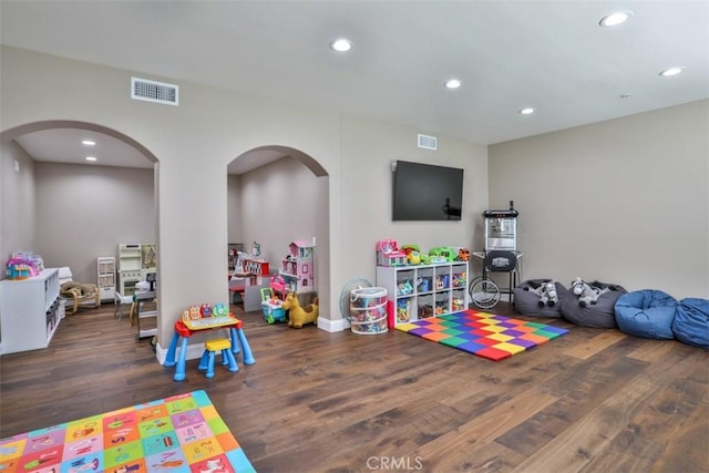 2564 Lunes Ln, Verne, CA 91750 - recreation room featuring arched walkways, wood finished floors, and recessed lighting