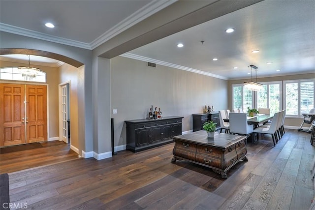2564 Lunes Ln, Verne, CA 91750 - entrance foyer with dark wood finished floors, arched walkways, recessed lighting, and crown molding