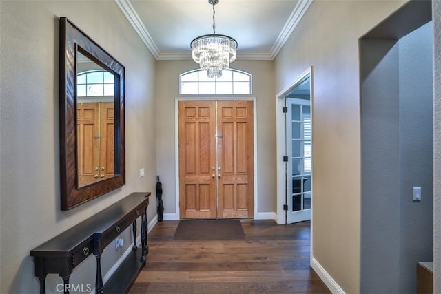 2564 Lunes Ln, Verne, CA 91750 - foyer featuring a chandelier, dark wood-style floors, and crown molding