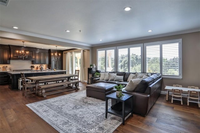 2564 Lunes Ln, Verne, CA 91750 - living area featuring ornamental molding, dark wood-style flooring, recessed lighting, and a chandelier