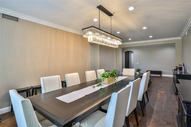 2564 Lunes Ln, Verne, CA 91750 - dining room featuring arched walkways, ornamental molding, dark wood-style floors, a chandelier, and recessed lighting