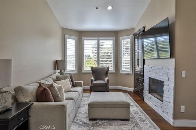2564 Lunes Ln, Verne, CA 91750 - living area featuring dark wood-type flooring and a fireplace