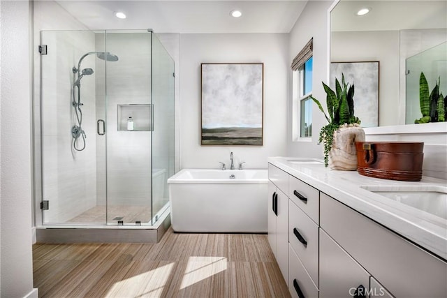 729 Oliver Ave, Placentia, CA 92870 - bathroom featuring double vanity, a shower stall, a soaking tub, and recessed lighting