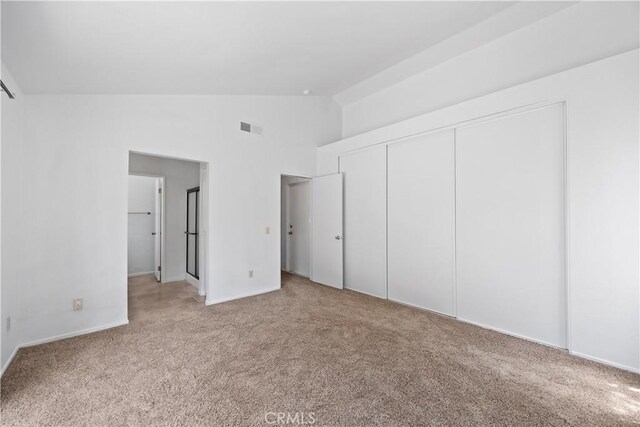 4706 Crestmont Pl, Oceanside, CA 92056 - unfurnished bedroom with carpet floors, vaulted ceiling, and a closet