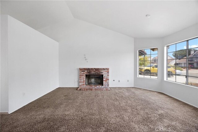 4706 Crestmont Pl, Oceanside, CA 92056 - unfurnished living room featuring carpet, a fireplace, and lofted ceiling