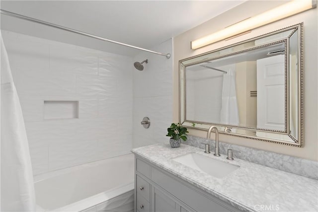 14853 Hartsook St Unit 106, Sherman Oaks, CA 91403 - bathroom featuring shower / tub combo with curtain and vanity