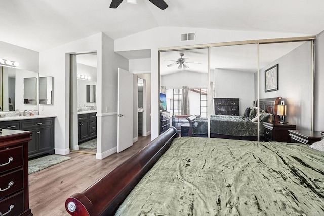 1527 Apache Dr Unit B, Chula Vista, CA 91910 - bedroom featuring lofted ceiling, light wood-style floors, ensuite bath, ceiling fan, and a closet