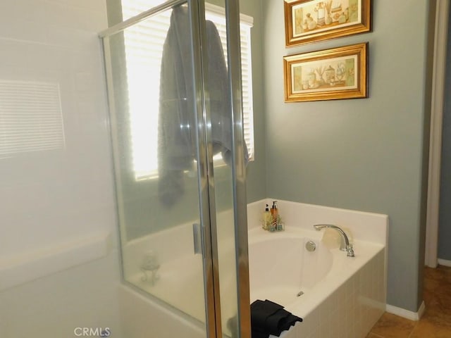 10947 Mesa Linda St, Victorville, CA 92392 - bathroom with a bath, an enclosed shower, and tile patterned flooring