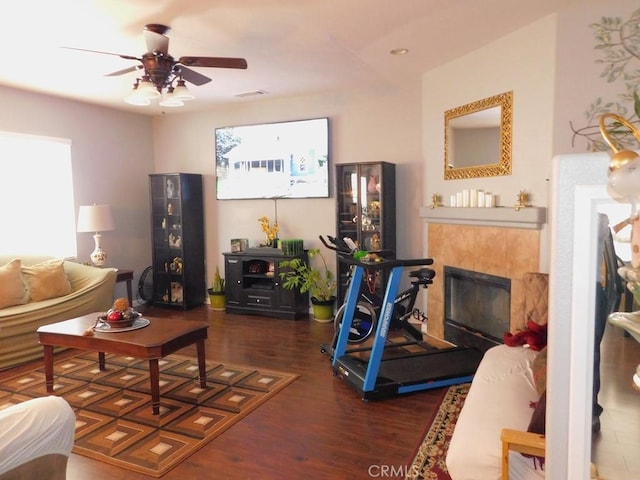 10947 Mesa Linda St, Victorville, CA 92392 - living room with wood finished floors, a ceiling fan, a fireplace, and recessed lighting