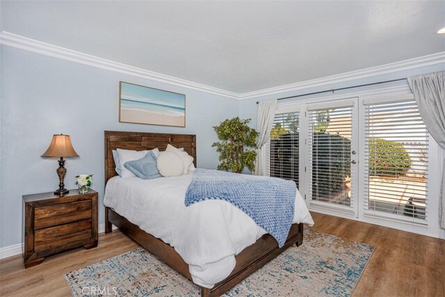 2001 Cypress Point Dr, Corona, CA 92882 - bedroom featuring access to exterior, crown molding, and light wood-style floors