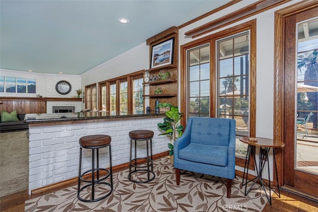 2001 Cypress Point Dr, Corona, CA 92882 - bar with crown molding, a fireplace, and recessed lighting