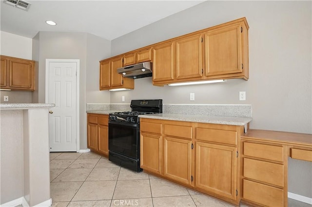 31868 Birchwood Dr, Lake Elsinore, CA 92532 - kitchen featuring black gas range oven, under cabinet range hood, light tile patterned floors, and recessed lighting