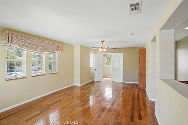 31868 Birchwood Dr, Lake Elsinore, CA 92532 - empty room with hardwood / wood-style flooring, ceiling fan, and a smoke detector