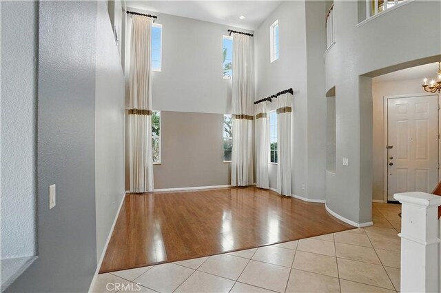 31868 Birchwood Dr, Lake Elsinore, CA 92532 - tiled entryway with a high ceiling and a chandelier