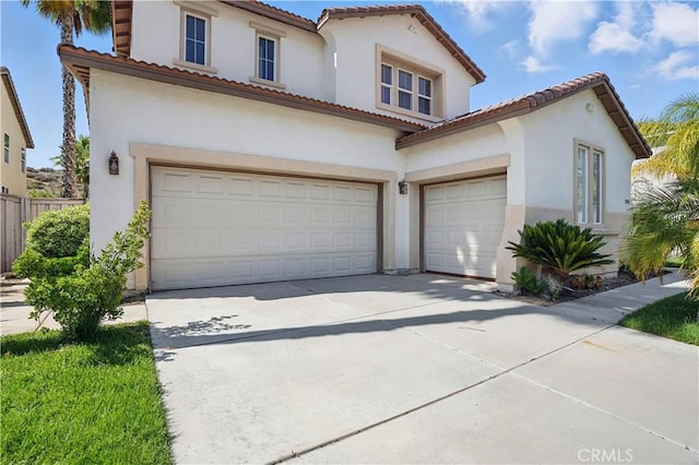 31868 Birchwood Dr, Lake Elsinore, CA 92532 - mediterranean / spanish home with stucco siding, driveway, a garage, and a tile roof