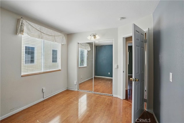 31868 Birchwood Dr, Lake Elsinore, CA 92532 - unfurnished bedroom with wood finished floors and a closet