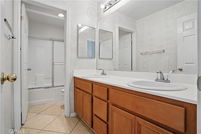 31868 Birchwood Dr, Lake Elsinore, CA 92532 - bathroom with double vanity, shower / bath combination with glass door, and tile patterned flooring