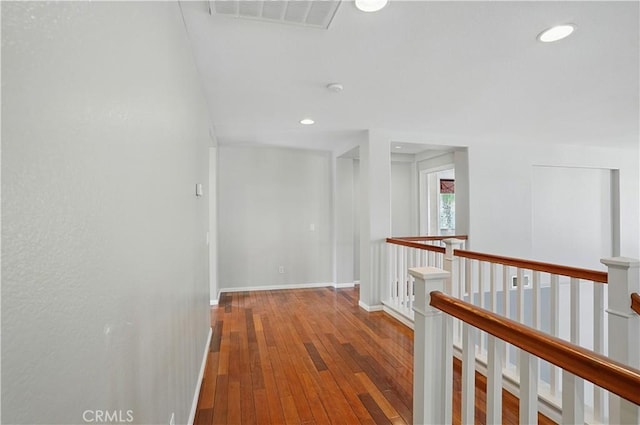 31868 Birchwood Dr, Lake Elsinore, CA 92532 - corridor featuring an upstairs landing, wood-type flooring, and recessed lighting