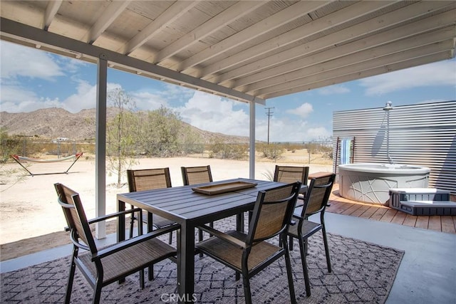4574 Avenida Del Sol, Joshua Tree, CA 92252 - view of patio with outdoor dining space and a deck with mountain view