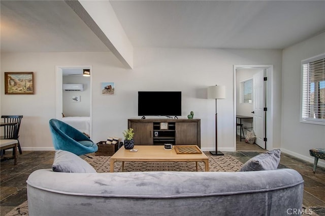 4574 Avenida Del Sol, Joshua Tree, CA 92252 - living room featuring stone tile flooring and baseboards
