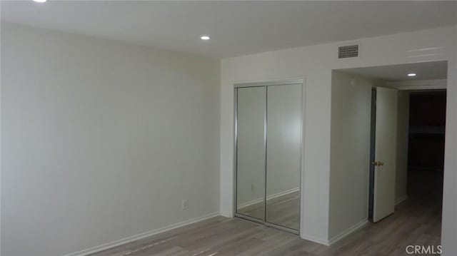 708 N Montebello Blvd, Montebello, CA 90640 - unfurnished bedroom with light wood finished floors, a closet, and recessed lighting