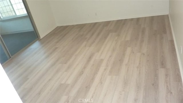 708 N Montebello Blvd, Montebello, CA 90640 - empty room with light wood-style flooring and baseboards
