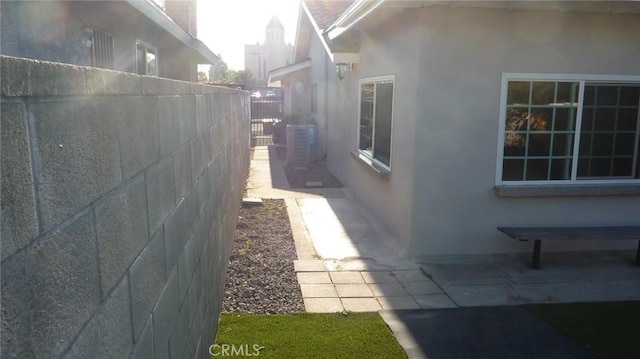 708 N Montebello Blvd, Montebello, CA 90640 - view of side of property featuring stucco siding and a central AC unit