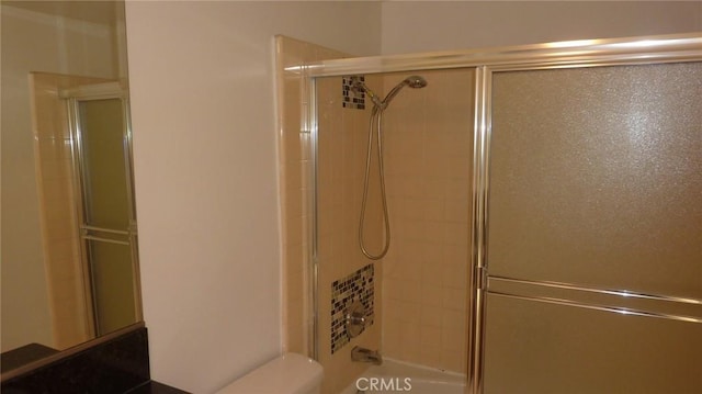 708 N Montebello Blvd, Montebello, CA 90640 - bathroom with toilet and combined bath / shower with glass door