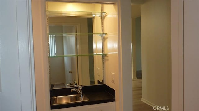 708 N Montebello Blvd, Montebello, CA 90640 - bathroom featuring baseboards and vanity