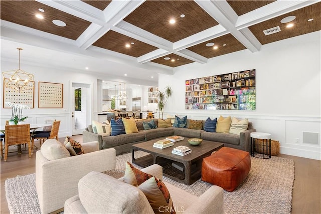 4164 Sunnyslope Ave, Sherman Oaks, CA 91423 - living room with a chandelier, coffered ceiling, wood finished floors, beam ceiling, and a decorative wall