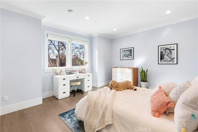 4164 Sunnyslope Ave, Sherman Oaks, CA 91423 - bedroom featuring crown molding, light wood-type flooring, recessed lighting, and an office area