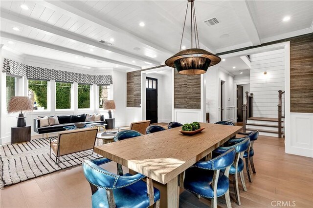 4164 Sunnyslope Ave, Sherman Oaks, CA 91423 - dining space with a wainscoted wall, light wood-style flooring, recessed lighting, beam ceiling, and a decorative wall