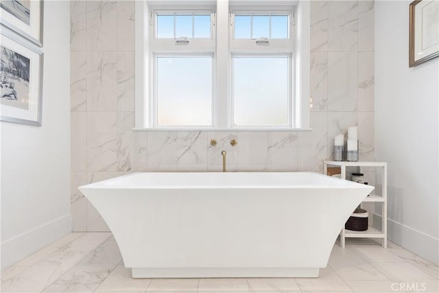 4164 Sunnyslope Ave, Sherman Oaks, CA 91423 - bathroom with marble finish floors, a soaking tub, plenty of natural light, and tile walls