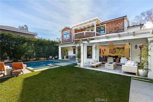 4164 Sunnyslope Ave, Sherman Oaks, CA 91423 - rear view of house featuring outdoor lounge area, a balcony, a lawn, and a patio area