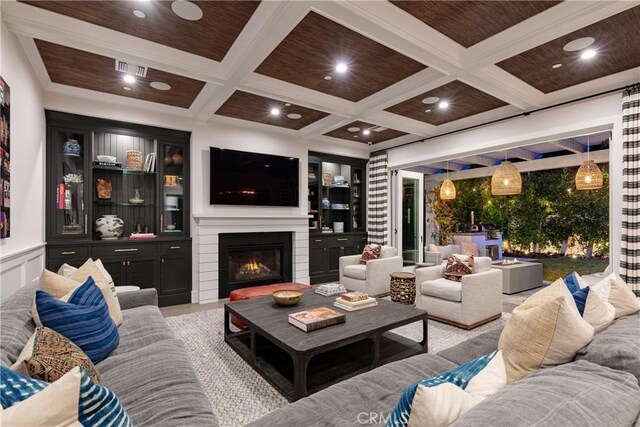 4164 Sunnyslope Ave, Sherman Oaks, CA 91423 - living room with coffered ceiling, a glass covered fireplace, beamed ceiling, and recessed lighting